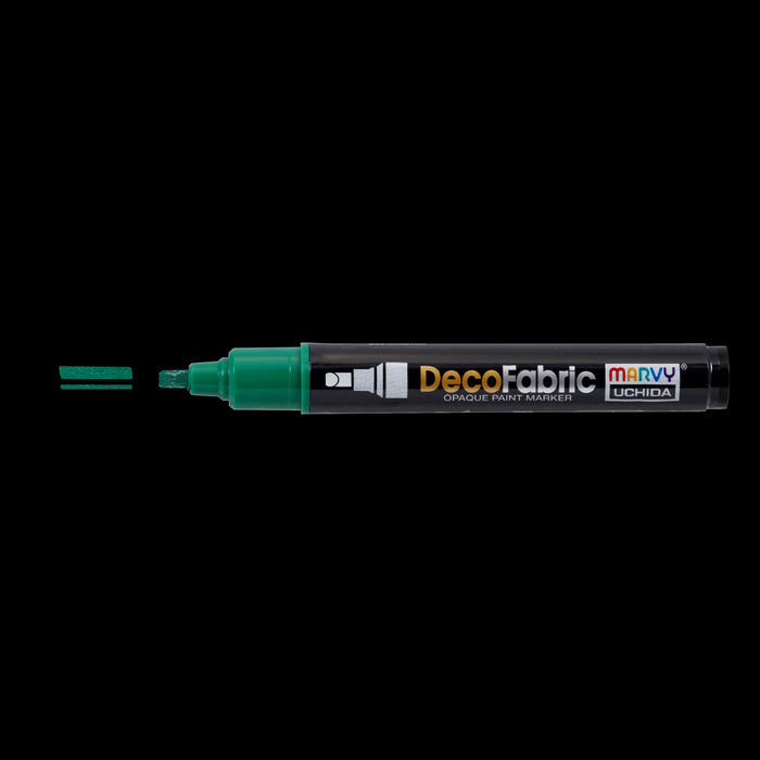 Decofabric marker green with cap off and color lines at tip with black background