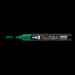 Decofabric marker green with cap off and color lines at tip with black background