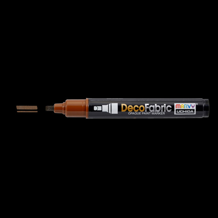Decofabric marker brown with cap off and color lines at tip with black background