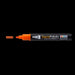 Decofabric marker orange with cap off and color lines at tip with black background