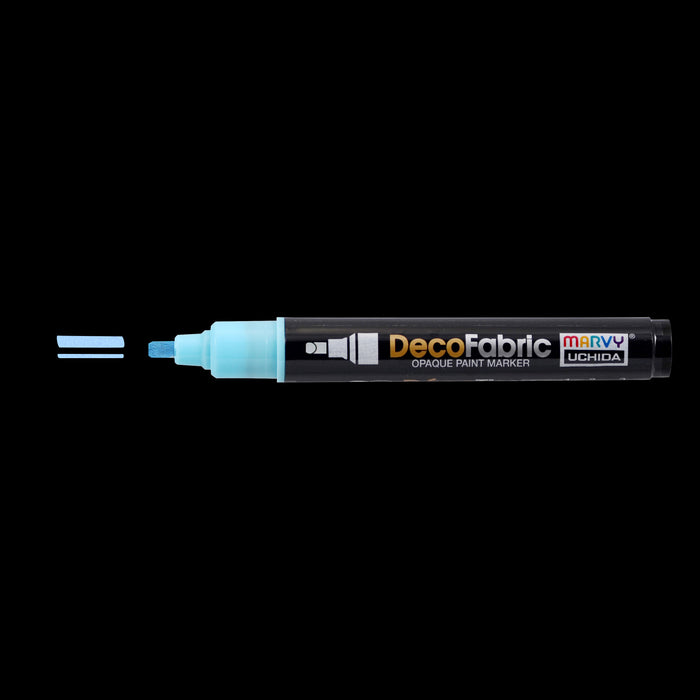 Decofabric marker fluorescent blue with cap off and a color line at tip with black background