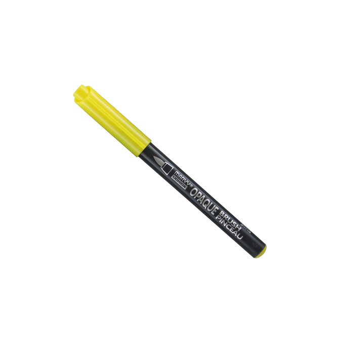 Opaque brush yellow marker with cap on