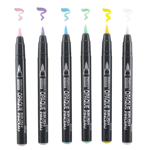 Opaque brush pastel set with cap off and with squiggle marks to show color. In bubblegum pink, wisteria, pale blue, peppermint, yellow and white.