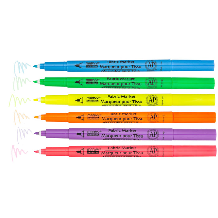 Shoe decor fabric marker fluorescent set with cap off an showing color squiggles at the tips. Fluorescent blue, fluorescent green, fluorescent yellow, fluorescent orange, fluorescent violet, and fluorescent pink.