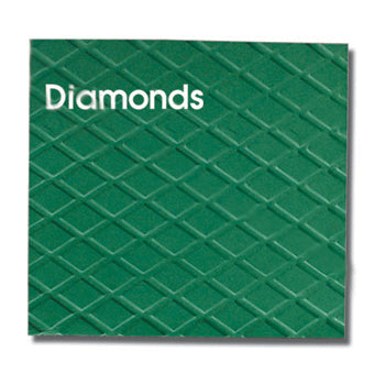 A sample paper with diamonds crimped on it 