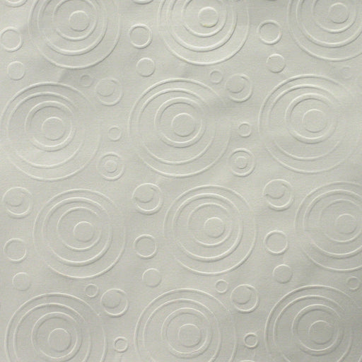 A paper sample with bubbles pattern crimped on it