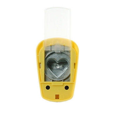 the bottom view of the CLEVER LEVER EXTRA JUMBO CRAFT PUNCH showing a slide out plastic piece that makes it easier to remove punched out shapes. 