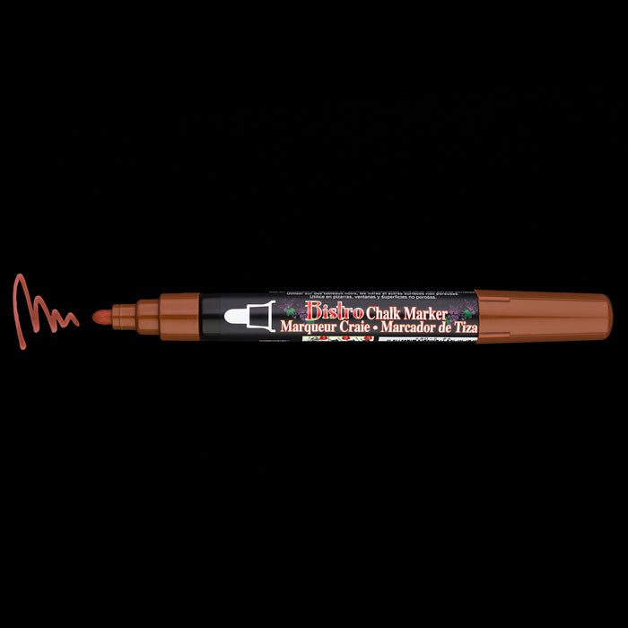 Bistro chalk broad tip brown with cap off showing ink color on a black background.