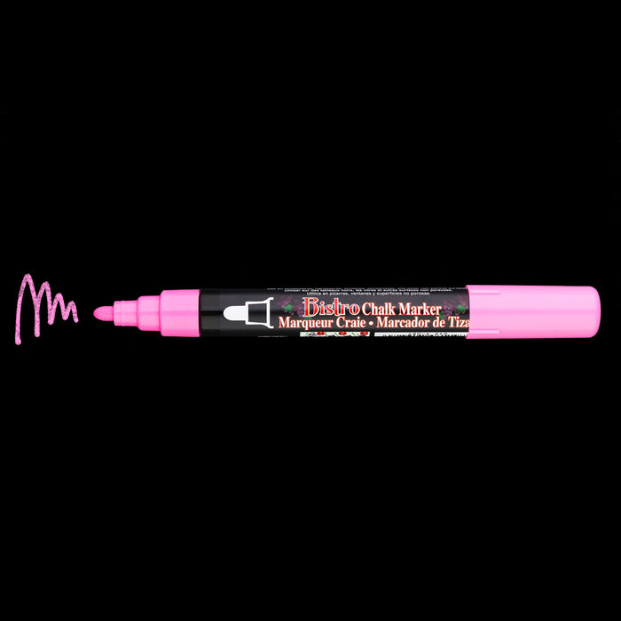 Bistro chalk fluorescent pink broad tip with cap off showing ink color on a black background.